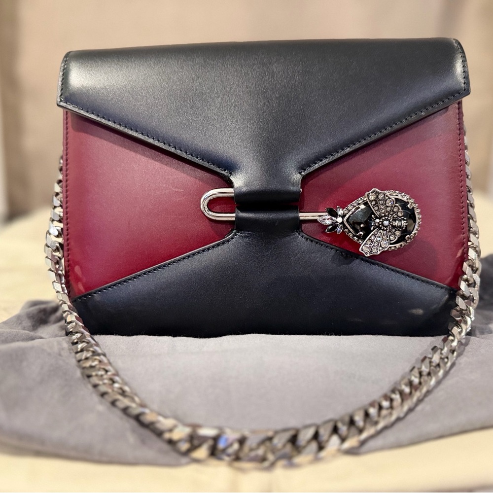 Like new Alexander McQueen burgundy and black envelope bag
